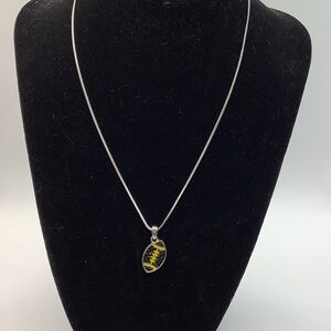 Black Football Pendant with Silver Toned Chain
